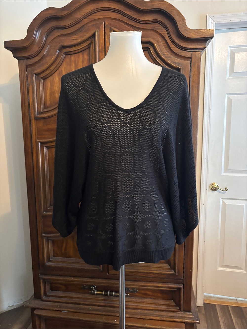 New York & Company black knit sweater with geometric pattern